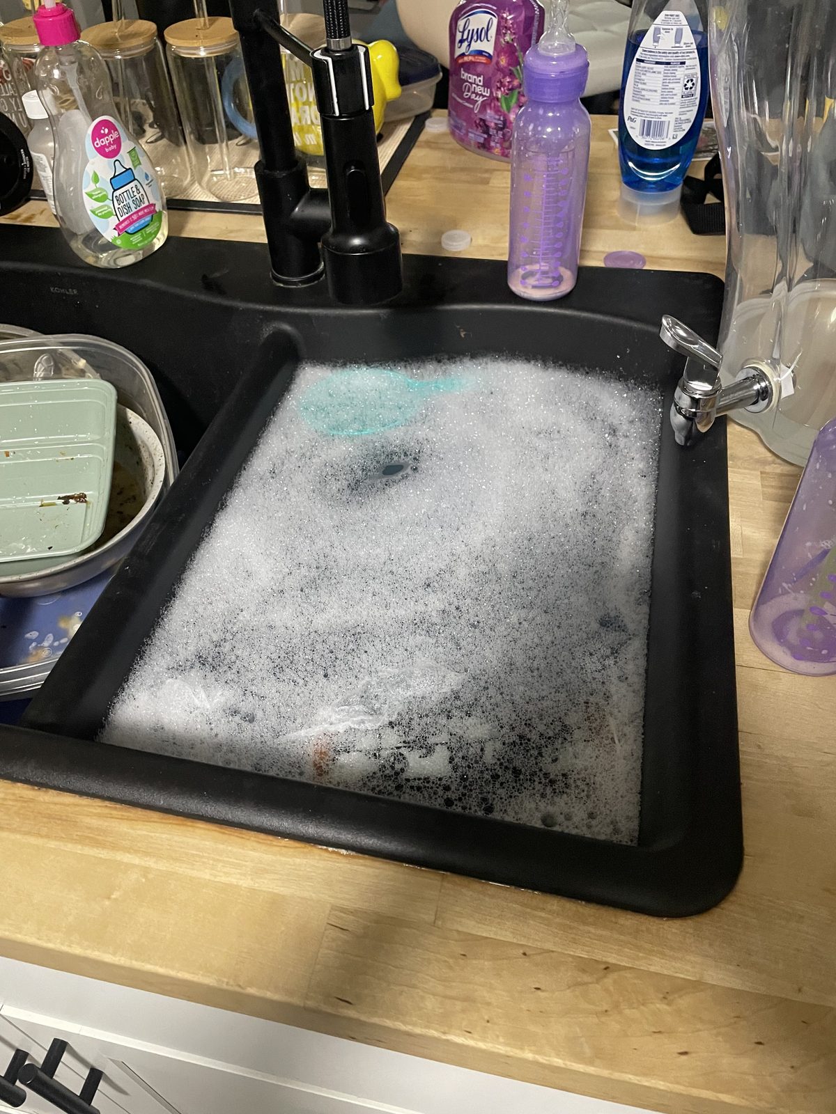 Before: kitchen sink drain clogged and backing up